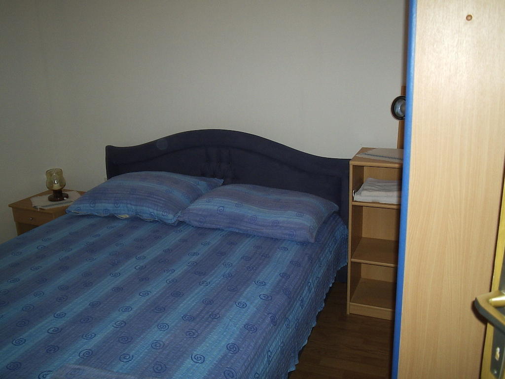 Apartments Holiday Λομπάρδα Δωμάτιο φωτογραφία